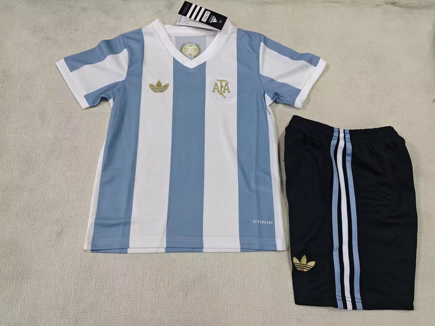 24/25 Kids Argentina Commemorative Edition Size: 16-28
