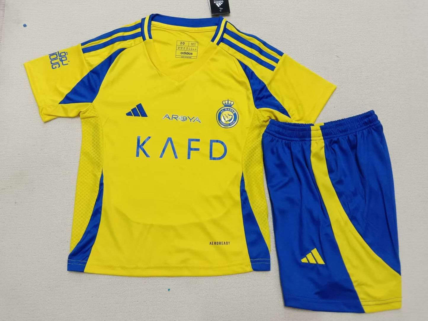 24/25 Kids Al Nassr Home Size: 16-28