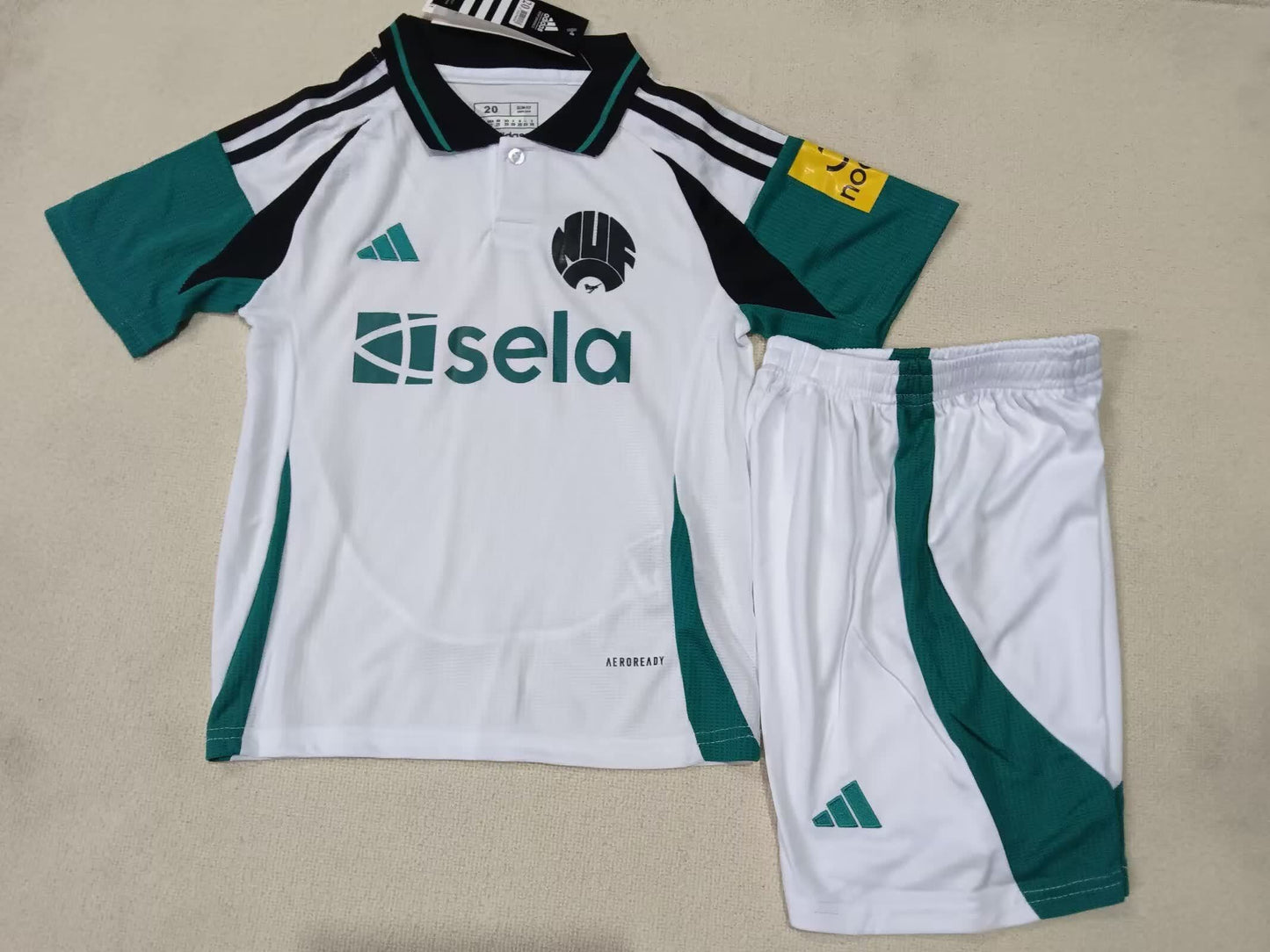 24/25 Kids Newcastle Second away Size: 16-28