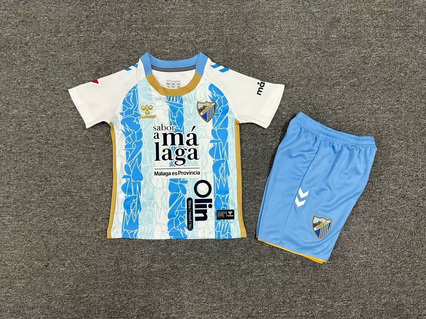 24/25 Kids Malaga Home Size: 16-28