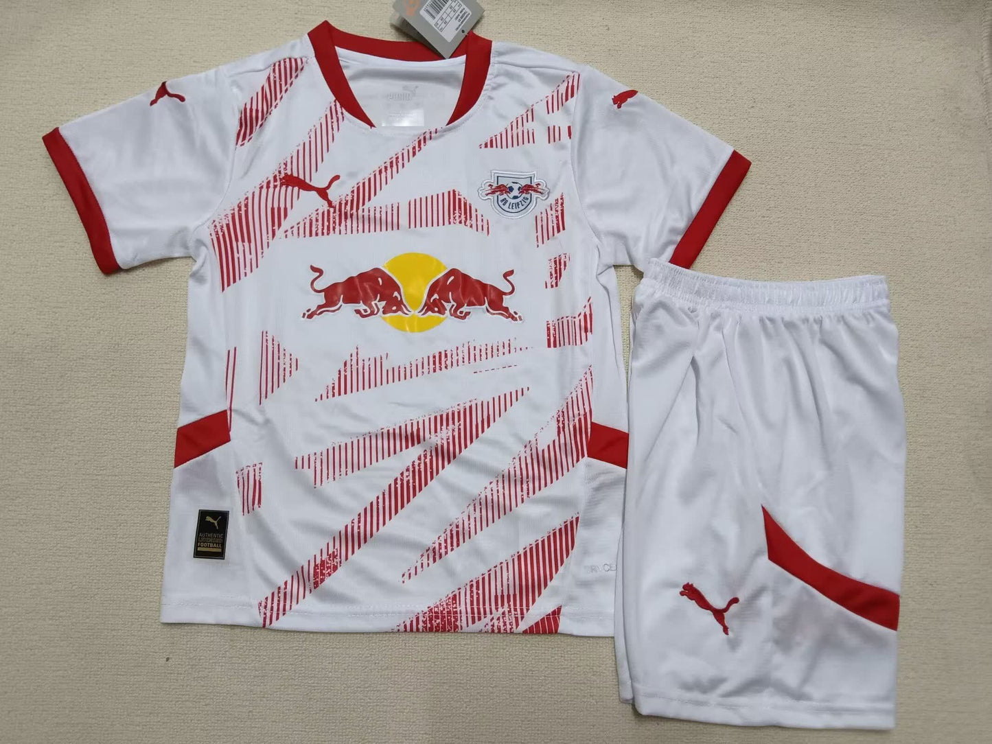 24/25 Kids Leipzig Red Bull Home Size: 16-28