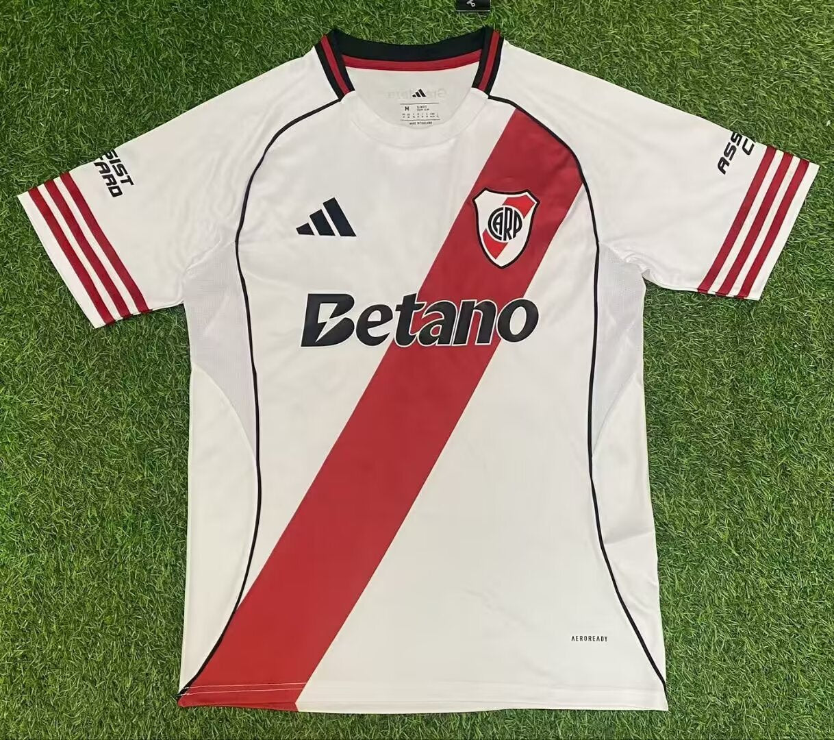25/26 River Plate home with advertisement S-XXL