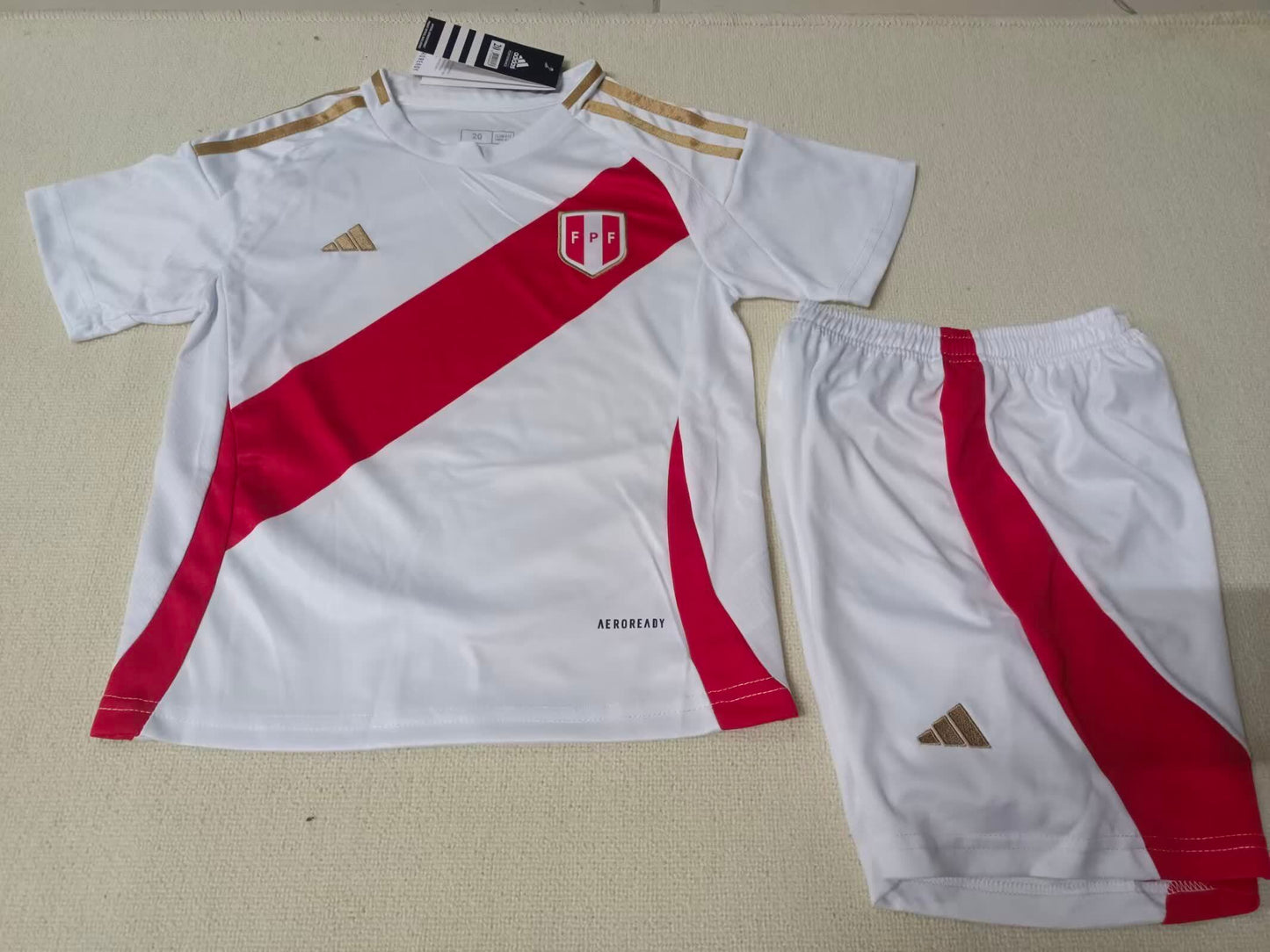 24/25 Kids Peru Home Size: 16-28