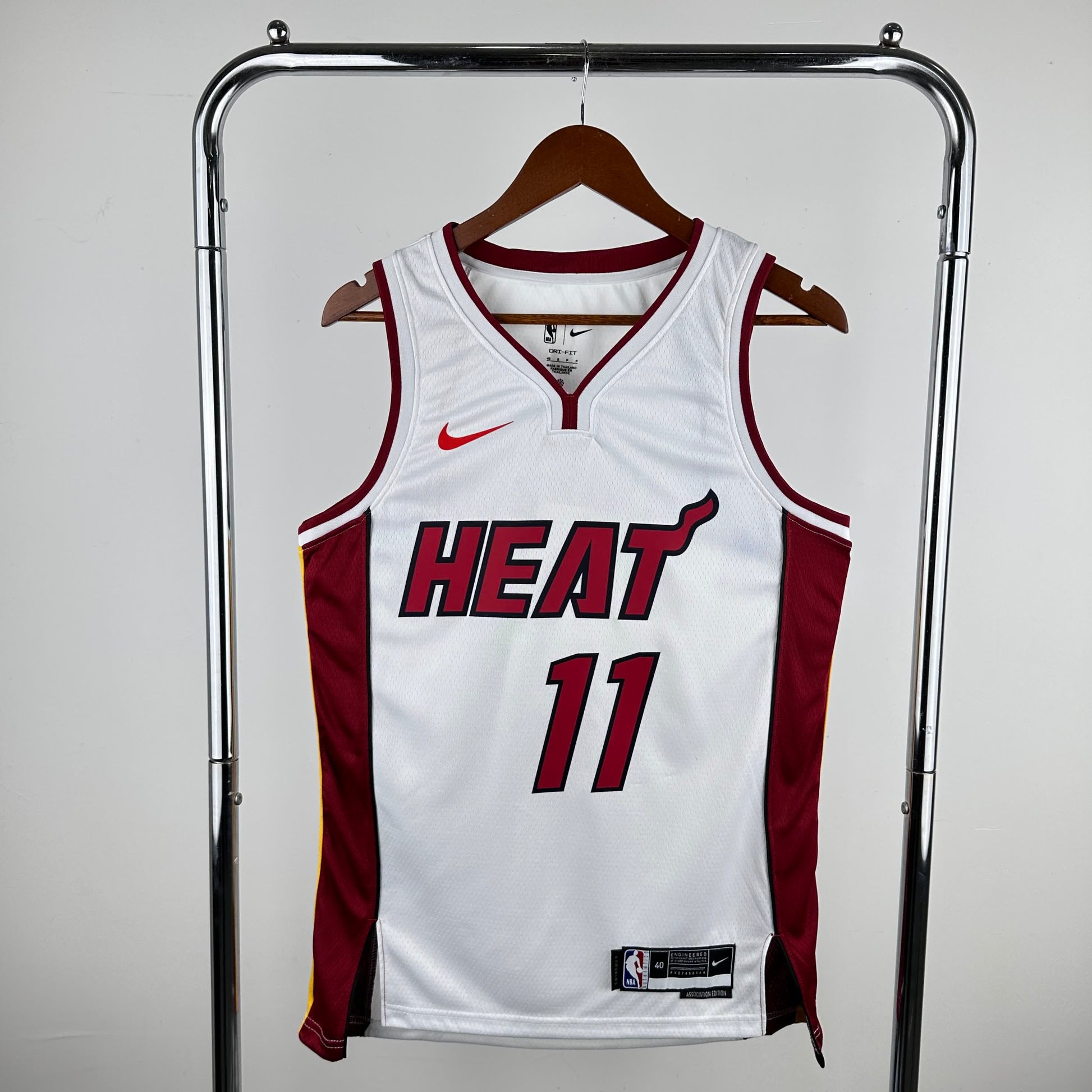 Heat V leads home white No. 11 JAQUEZ JR